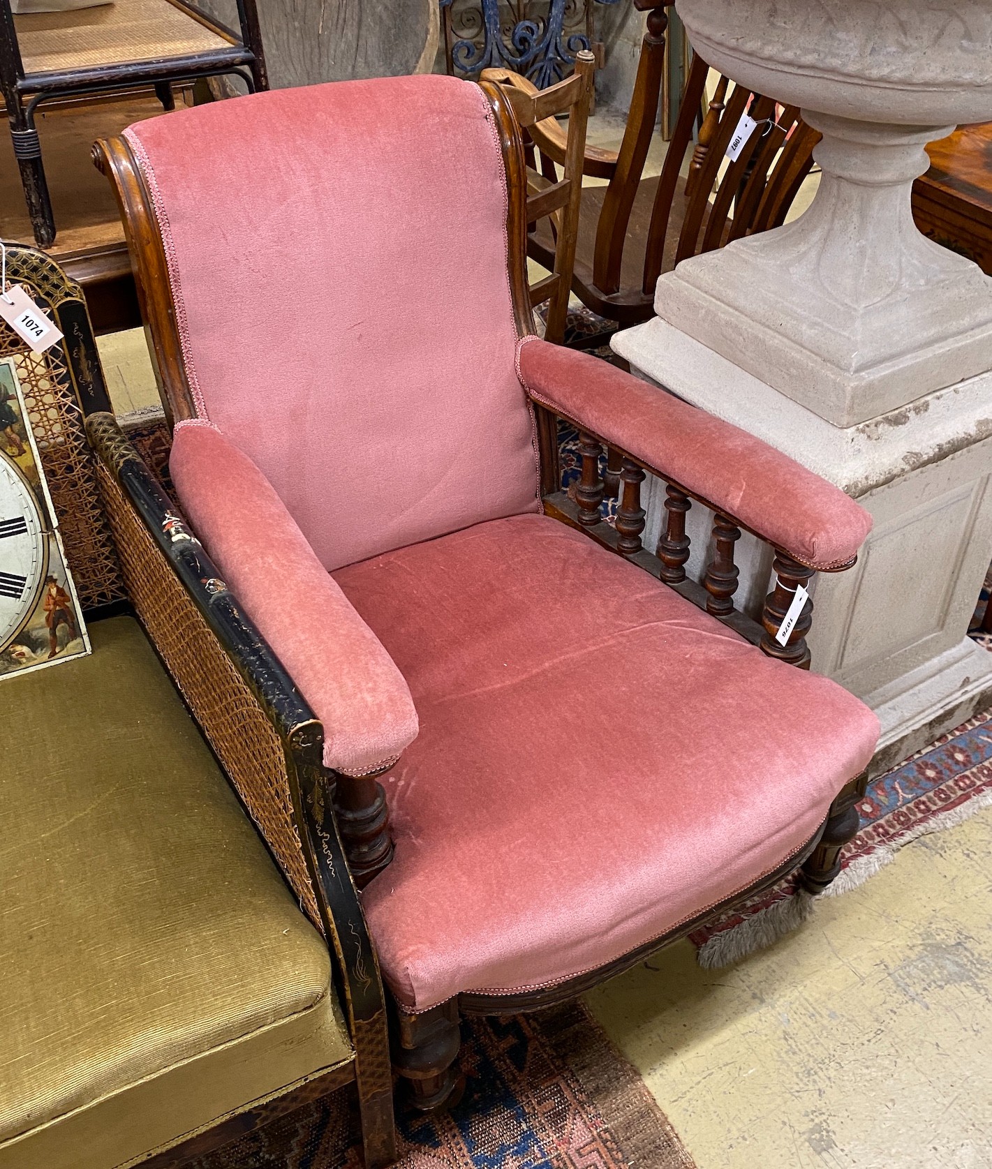 A late Victorian upholstered walnut open armchair, width 68cm, depth 84cm, height 90cm